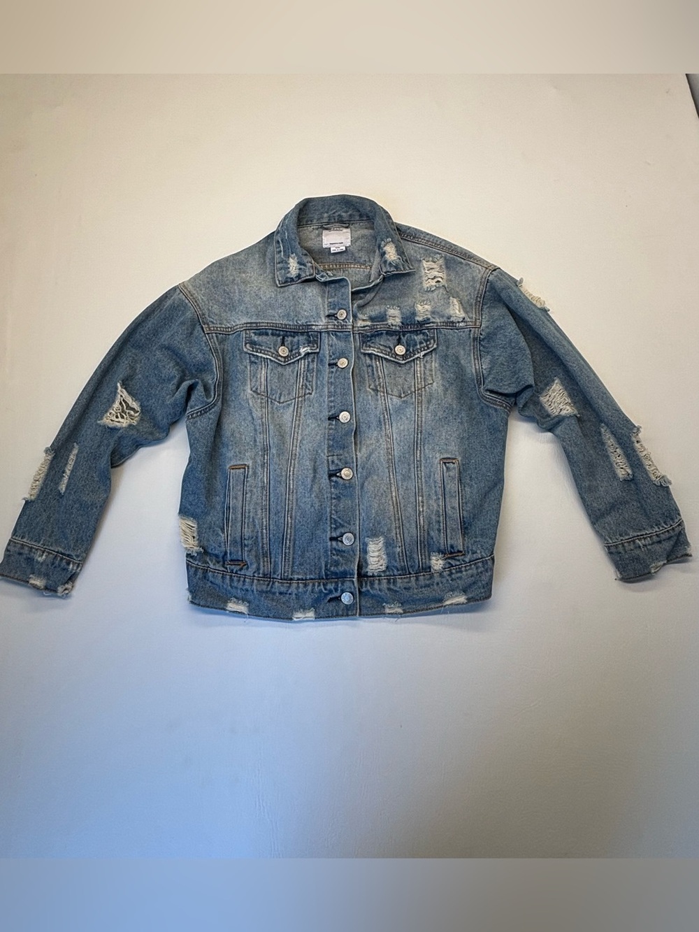 iris Woman’s Light Blue Distressed Denim Jacket